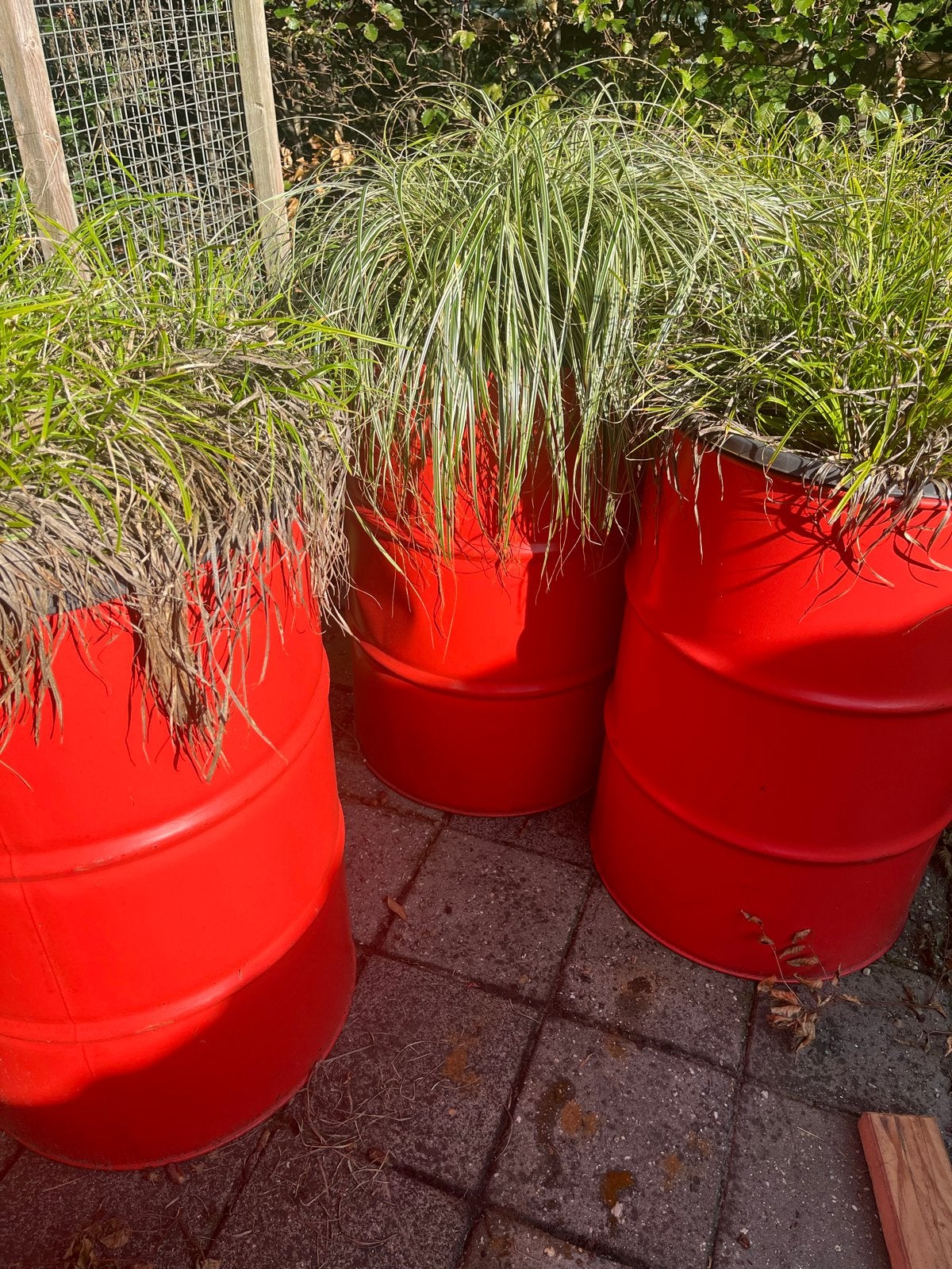 Set van 4 rode plantenbakken van olievaten, Gebruikt, Rond, Ophalen of Verzenden, Binnen