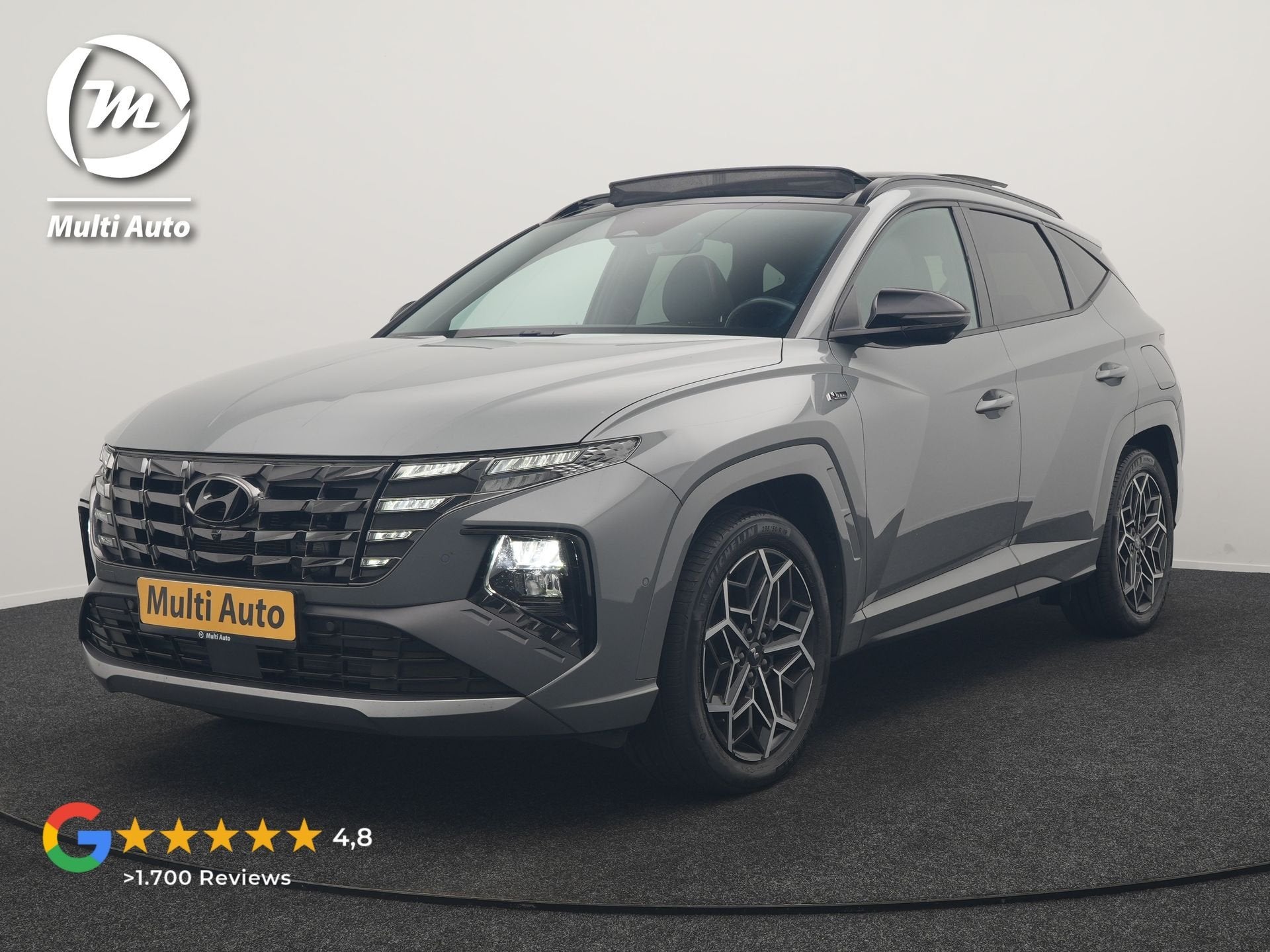 Hyundai Tucson 1.6 T-GDI N Line 4WD PHEV 265pk Dealer O.H |, Auto's, Automaat, Gebruikt, Zwart, 4 cilinders
