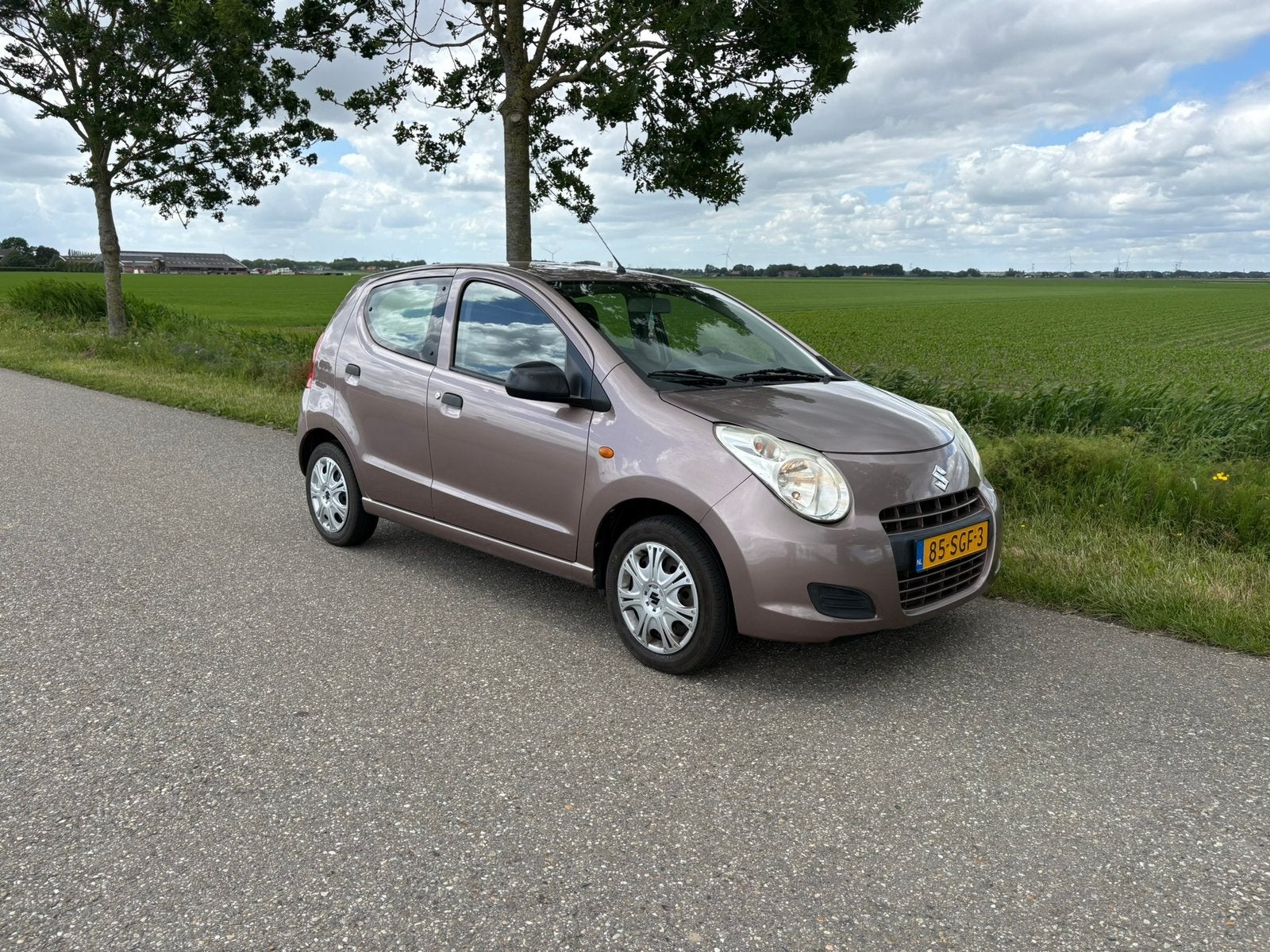 Suzuki Alto 2011 Bruin Airco 94.000 km, Voorwielaandrijving, Bruin, 4 stoelen, Origineel Nederlands