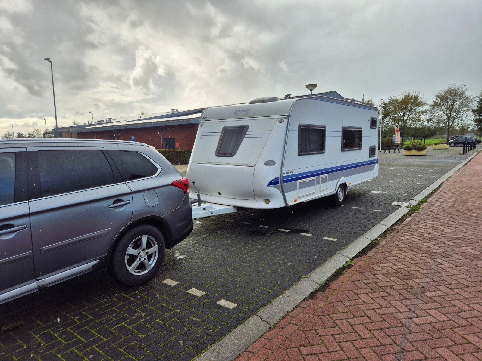 Hobby de luxe easy kmfe500 caravan bouwjaar 2005 met mover., Caravans en Kamperen, Ophalen, Zo goed als nieuw, Ten Cate All Season 240g/m2