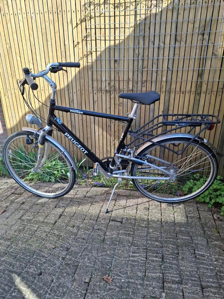Peugeot Voyage Trekking 24 versnellingen 28 inch, Fietsen en Brommers, Gebruikt, Versnellingen, 57 tot 61 cm, Ophalen