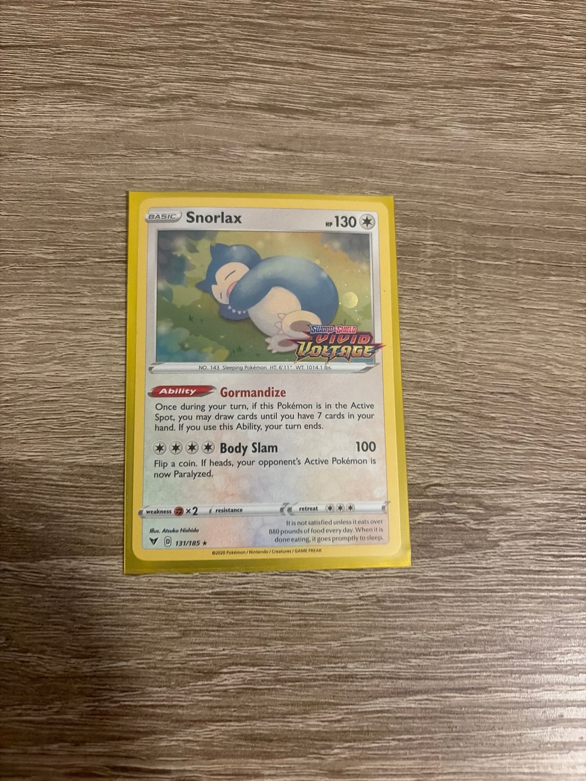 Snorlax 131/185 Vivid Voltage Pokémon Kaart, Ophalen of Verzenden, Zo goed als nieuw, Losse kaart