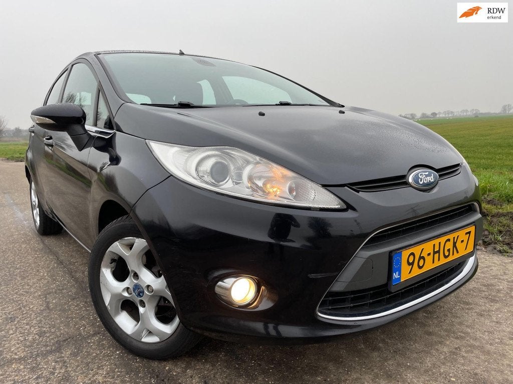 Ford Fiesta 1.4 Titanium / 5 drs clima pdc, Auto's, Ford, Bedrijf, Te koop, Fiësta, Airbags, Airconditioning, Automatische klimaatregeling