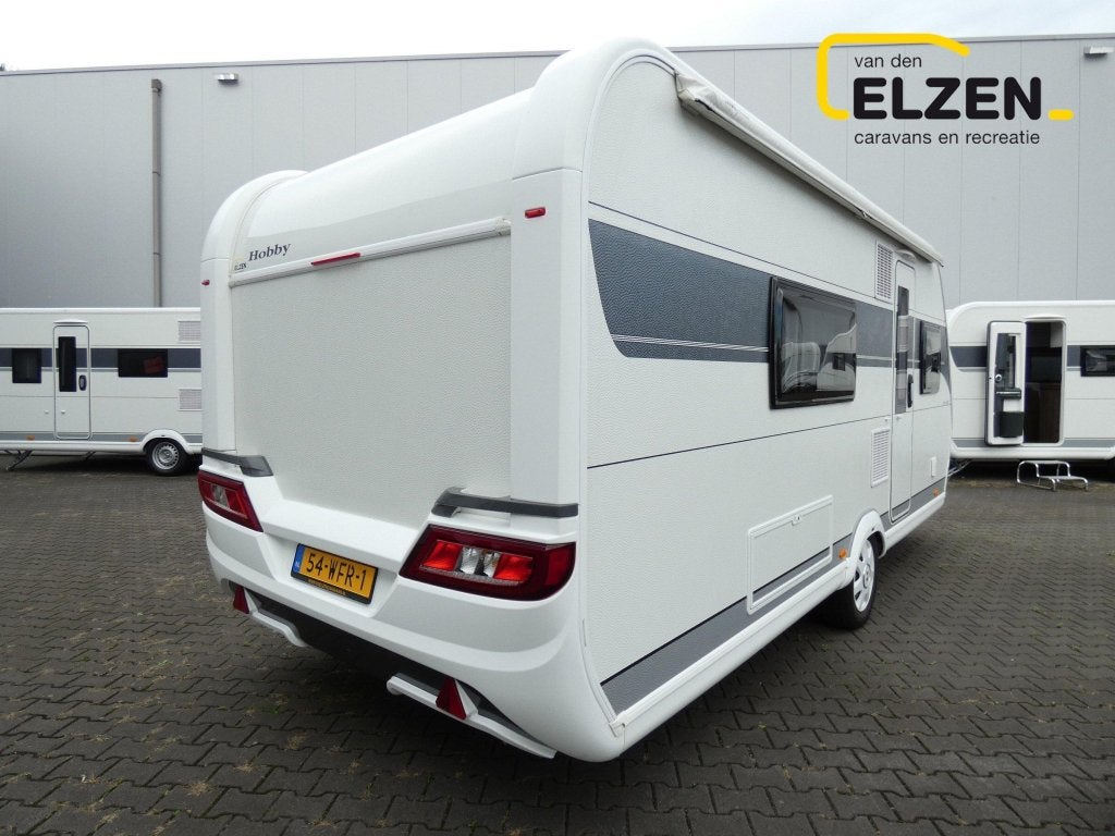 Hobby De Luxe 495 WFB Mover, luifel, badkamer, Caravans en Kamperen, Standaardzit, Schokbreker, Hobby, Bedrijf