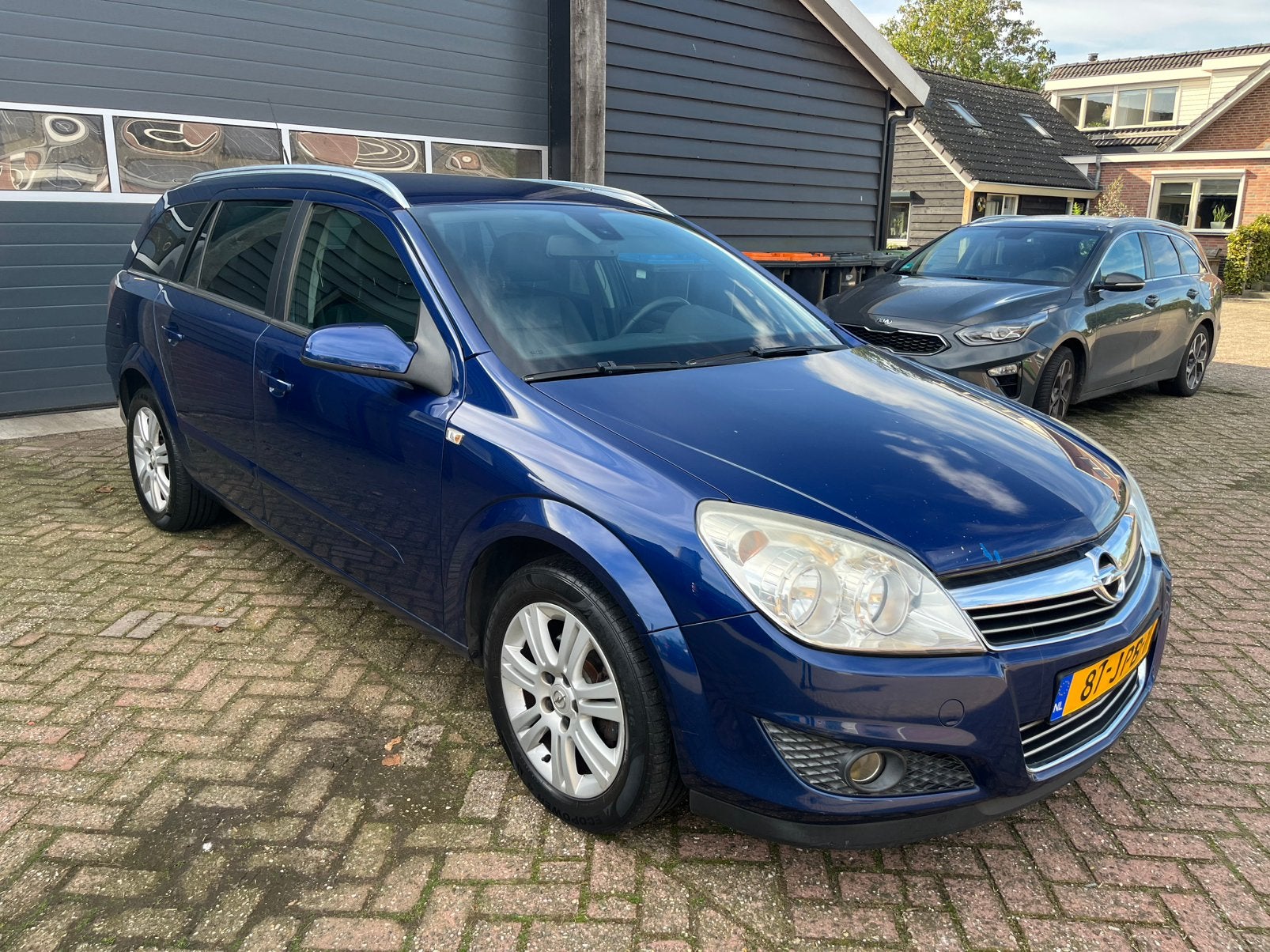 Opel Astra 1.6 16V St.wgn. Easytronic 2009 Blauw automaat!, Electronic Stability Program (ESP), Zwart, Blauw, 630 kg