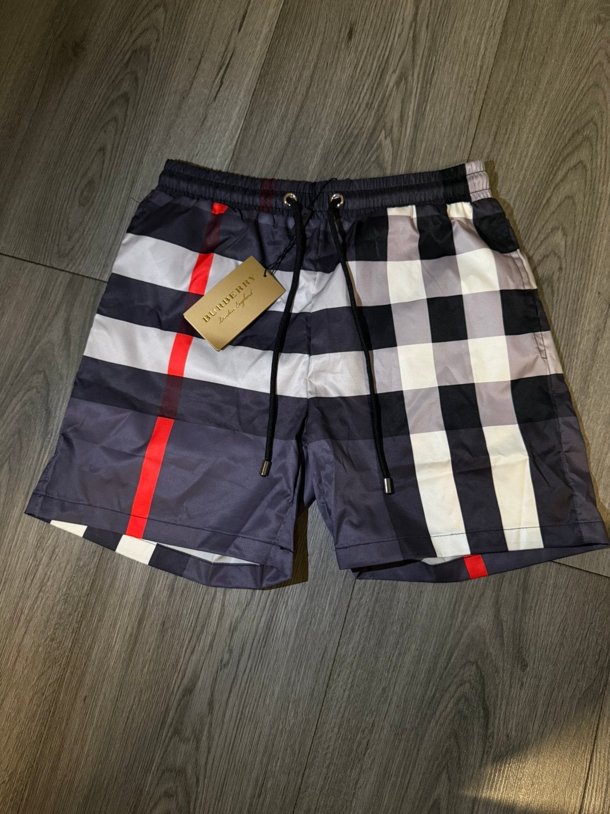 Burberry zwembroek maat m, Ophalen of Verzenden, Zo goed als nieuw, Regenjas