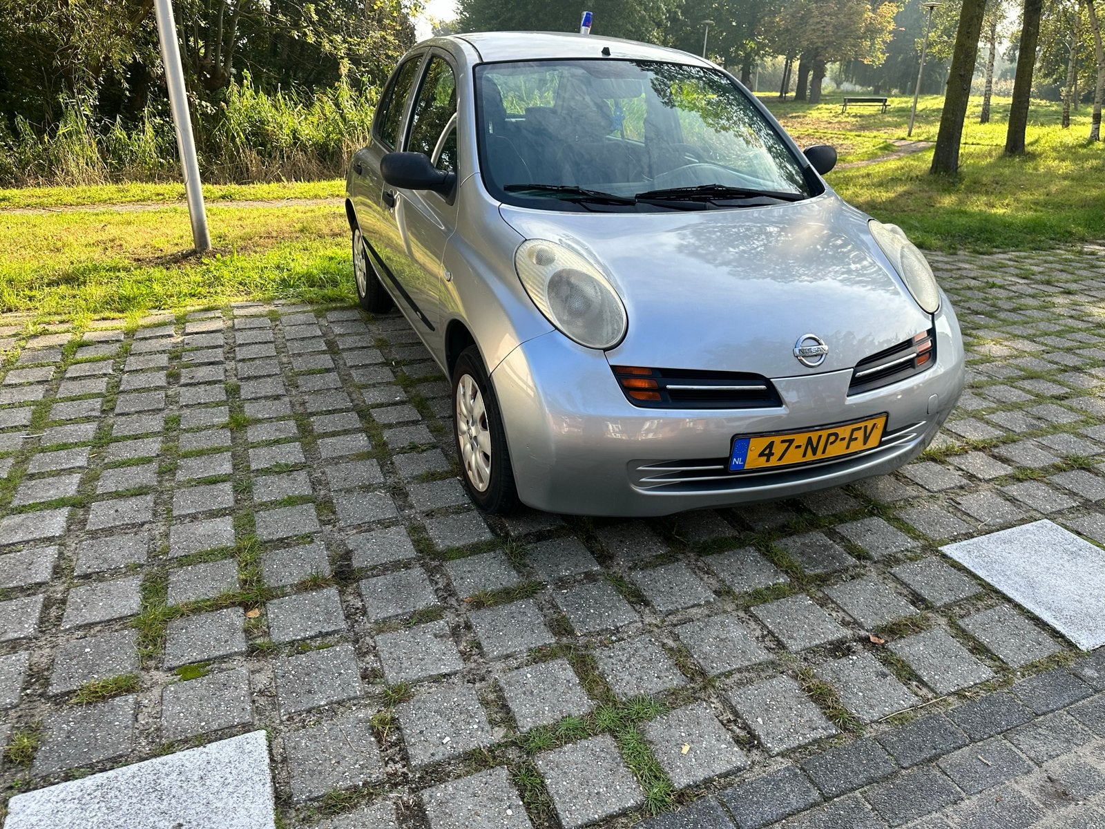 Nissan Micra 1.2 59KW 5DR 2004 Grijs, Voorwielaandrijving, 40 €/maand, 4 cilinders, Origineel Nederlands