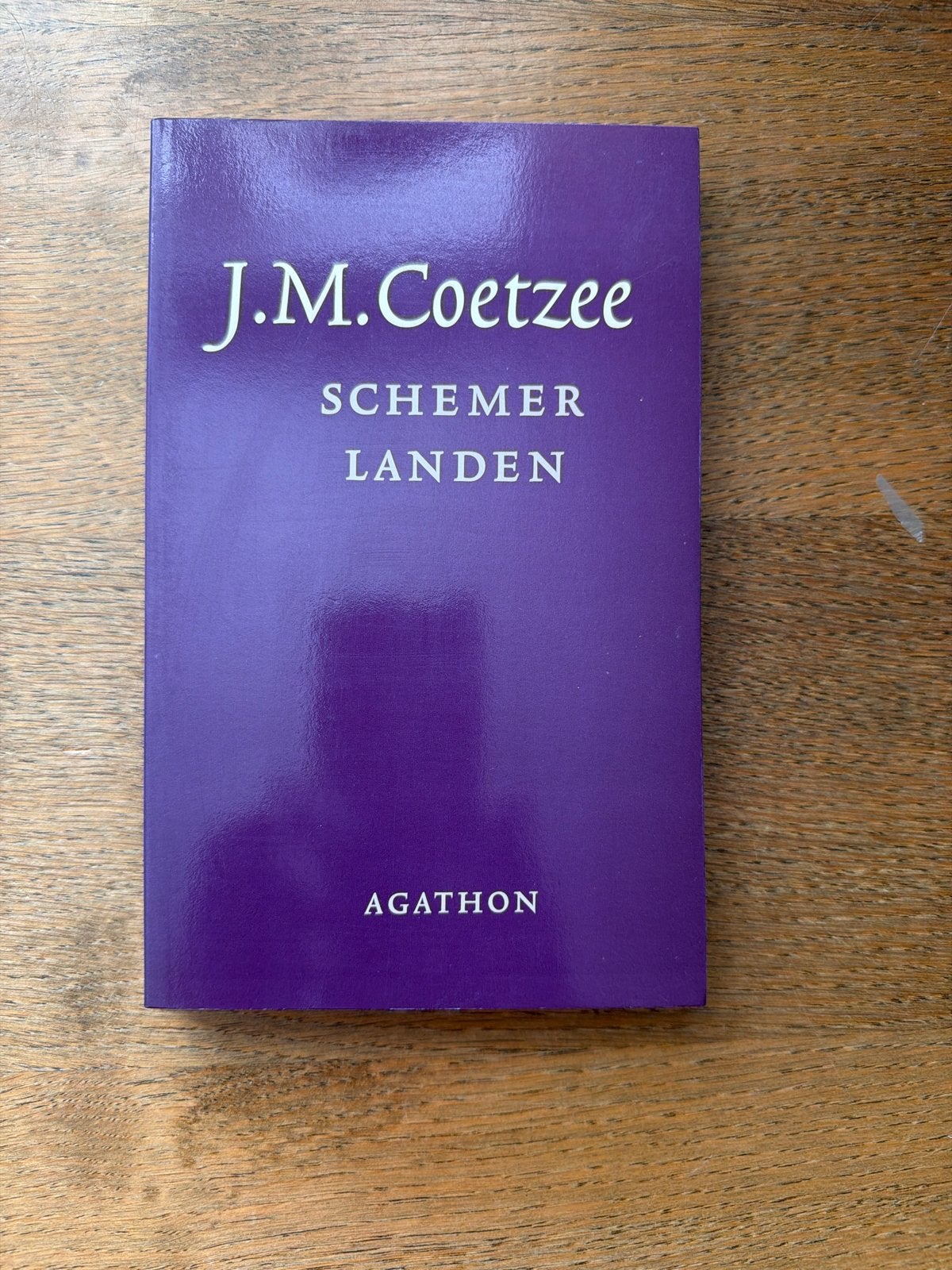 J.M. Coetzee - Schemerlanden (Agathon), Boeken, Romans, Zo goed als nieuw, Nederland, Ophalen of Verzenden