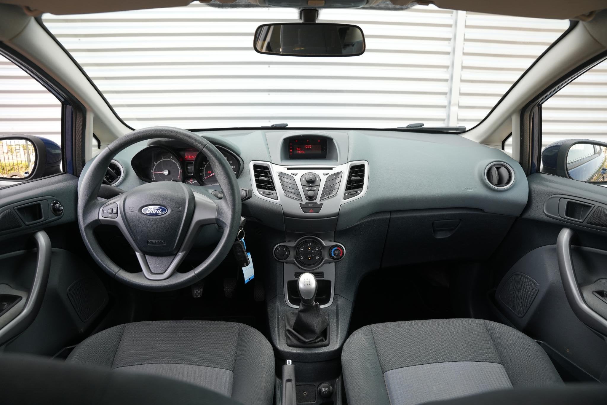 Ford Fiesta 1.25 Limited Airco Radio/CD, Auto's, Ford, Voorwielaandrijving, Stof, Gebruikt, 4 cilinders