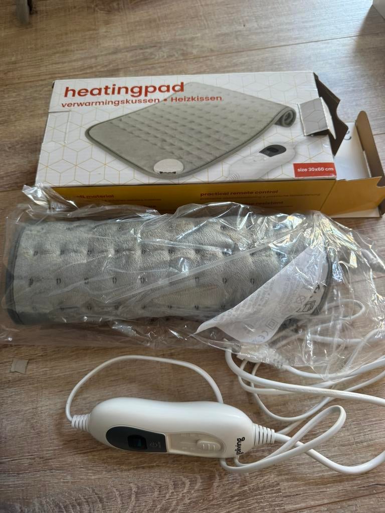 Nieuwe Heatingpad warmtedeken grijs 30x60, Ophalen of Verzenden, Zo goed als nieuw, Eenpersoons