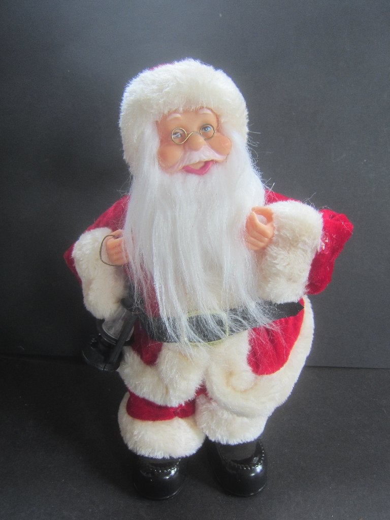 een staande en vrolijke kerstman  30 cm hoog, Ophalen of Verzenden, Zo goed als nieuw