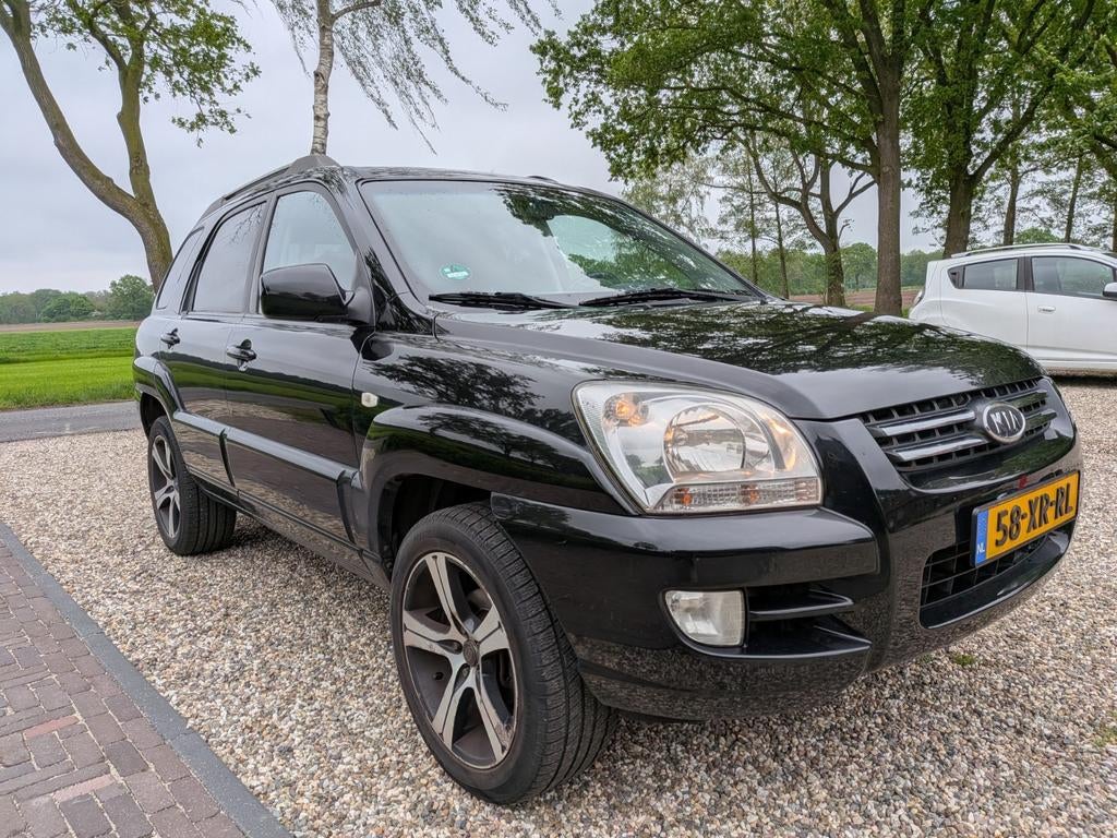 Kia Sportage 2.0 CVVT 2WD Zwart, 1442 kg, 4 cilinders, Zwart, 75 €/maand
