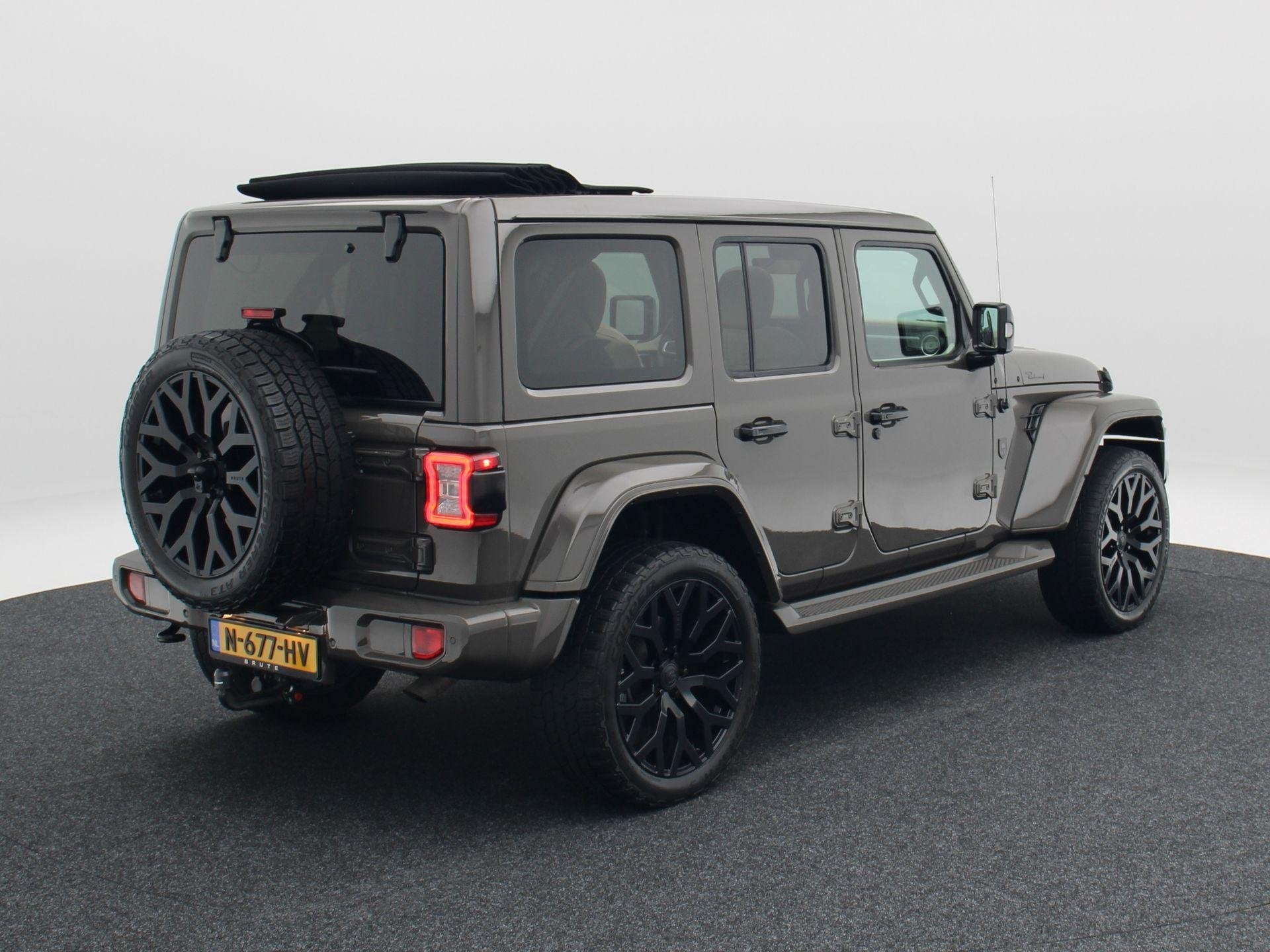 Jeep Wrangler Unlimited 4xe 380 Sahara BRUTE | Wit leder | E, Auto's, Automaat, Dealer onderhouden, Euro 6, 4 cilinders