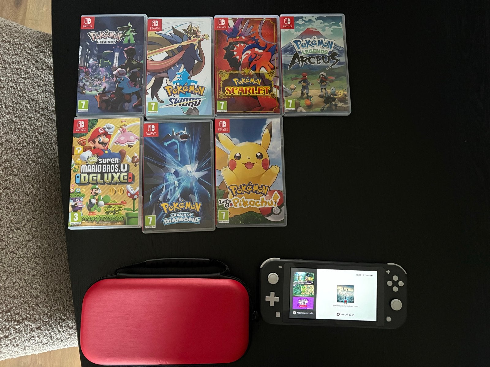 Nintendo Switch Lite met 7 games - compleet, Met games, Ophalen of Verzenden, Zo goed als nieuw, Zonder controller