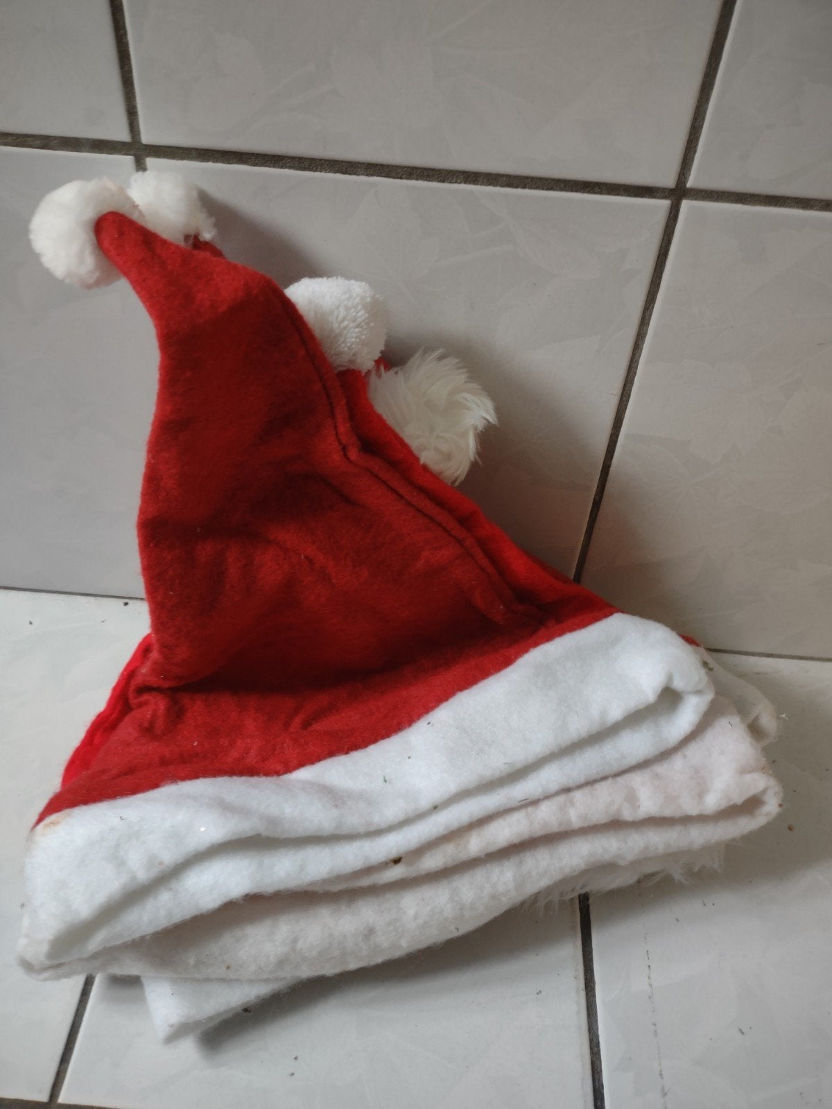 Kerstmuts, Diversen, Ophalen