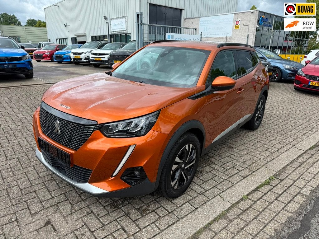 Peugeot 2008 1.2 PureTech Allure 130PK, Navigatie Automaat, Gebruikt, Leder en Stof, Origineel Nederlands, 1180 kg