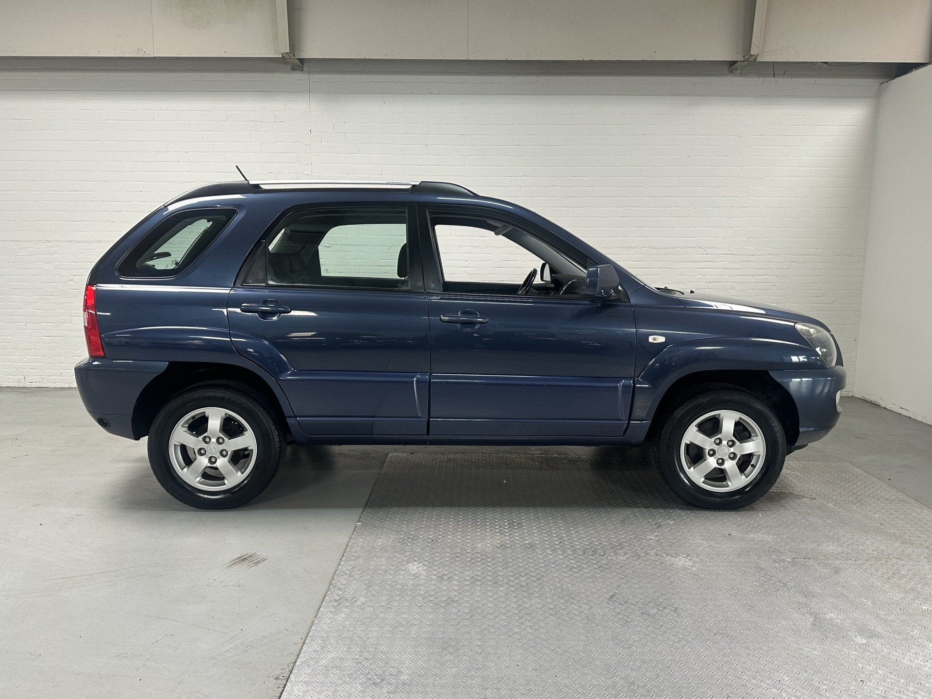 Kia Sportage 2.0 CVVT X-ecutive CLIMA / TREKHAAK / CRUISE, Stof, 4 cilinders, Blauw, Origineel Nederlands