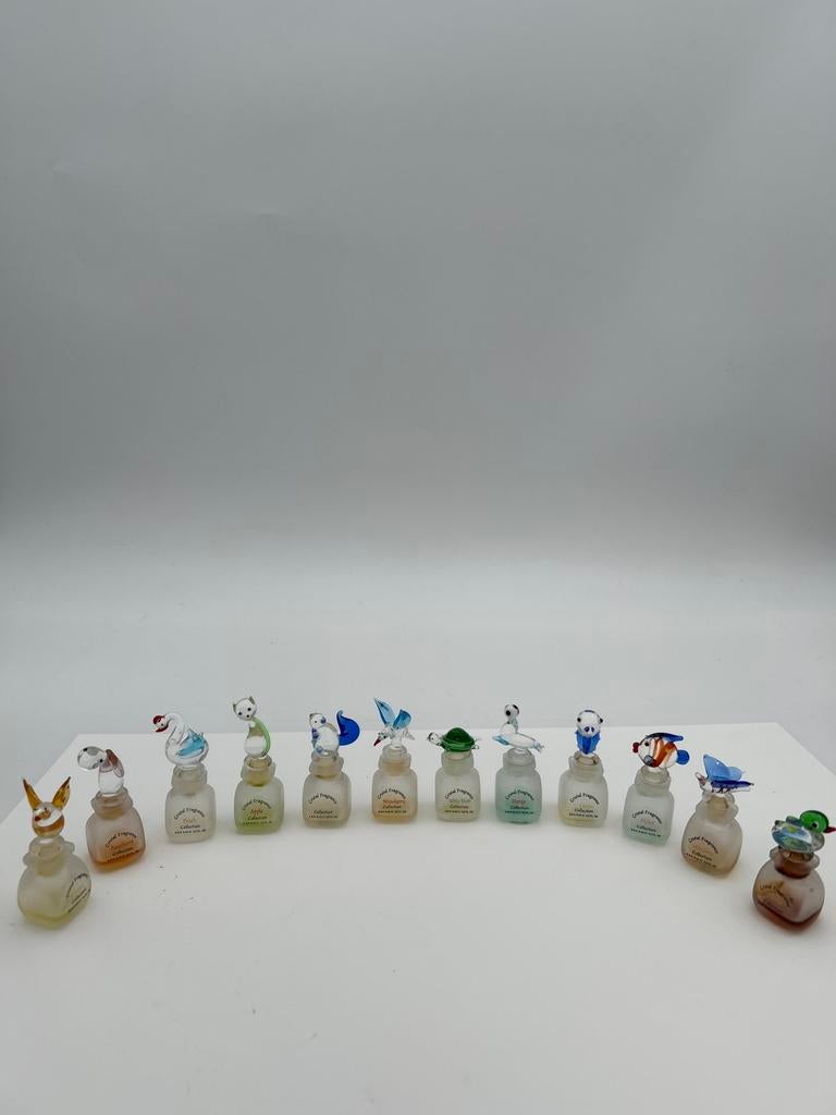 Verzameling van 12 glazen parfumflesjes met dierenfiguren, Ophalen of Verzenden, Zo goed als nieuw