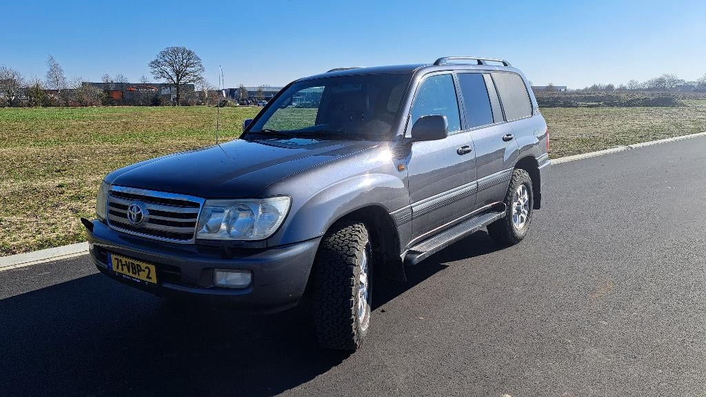 Toyota Landcruiser 100 4.2 TD grijs kenteken, Auto's, Automaat, Zwart, 4164 cc, Bedrijf