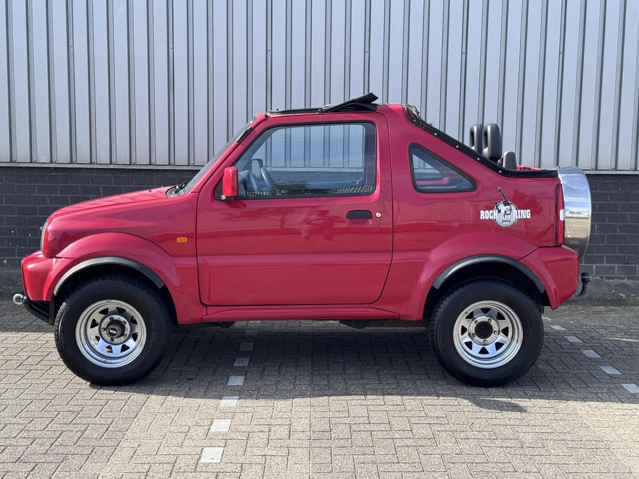Suzuki Jimny 1.3 Exclusive 4x4 Cabrio | Hardtop | Rock am Ri, Auto's, Euro 5, Gebruikt, Cabriolet, 4 stoelen