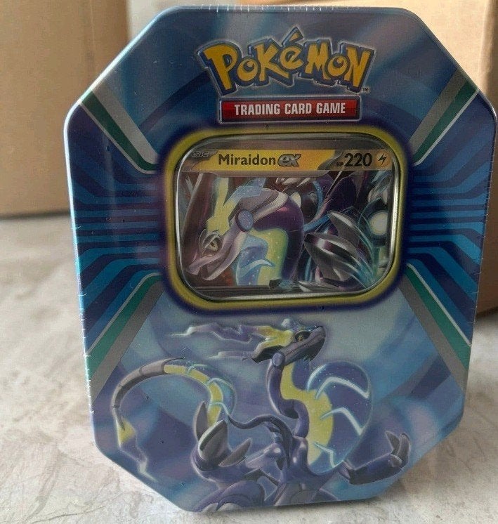 PGeseald Pokémon TCG Koraidon & Miraidon GX Tin Boxen, Ophalen, Nieuw, Overige typen, Foil
