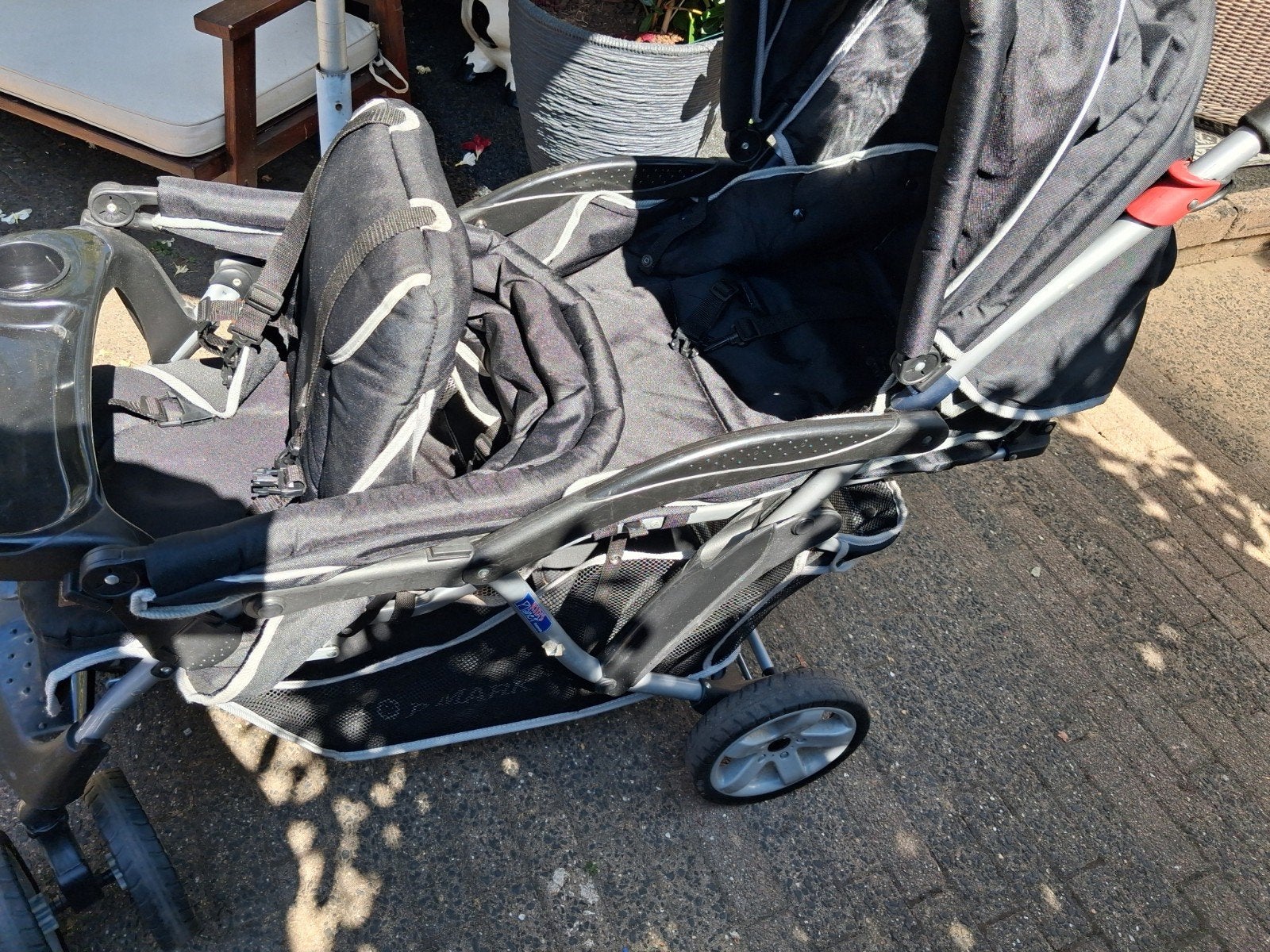 dubbele zwarte kinderwagen in nieuwstaat, Ophalen, Zo goed als nieuw, Kinderwagen of Buggy