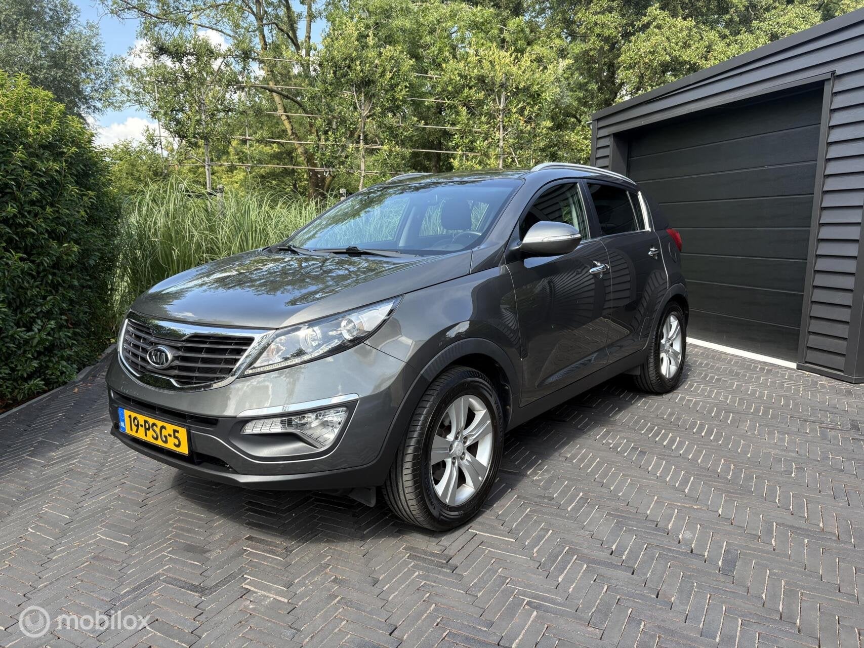 Kia Sportage 2.0 X-ecutive Plus Pack|Trekhaak|Airco|, Auto's, Gebruikt, 4 cilinders, Parkeersensor, 163 pk