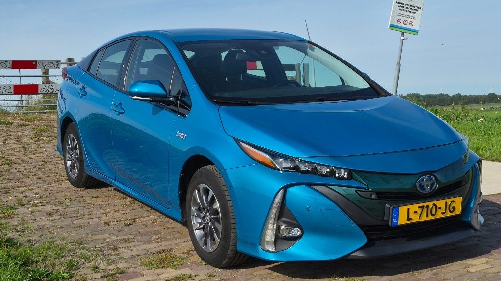 Toyota Prius 1.8 Plug-in Hybrid 122PK Aut 2017 Blauw, Auto's, Zwart, 122 pk, Verwarmde buitenspiegels, Prius