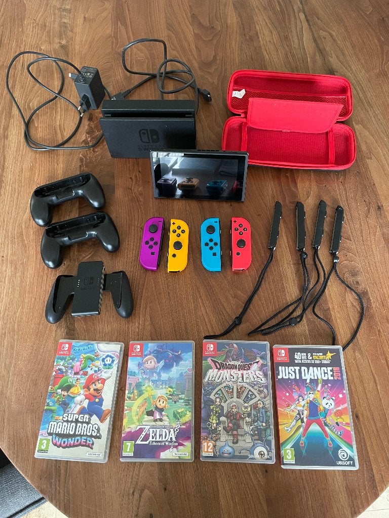 Nintendo Switch met 4 games en extra controllers, Ophalen of Verzenden, Switch Original, Met 3 controllers of meer, Gebruikt