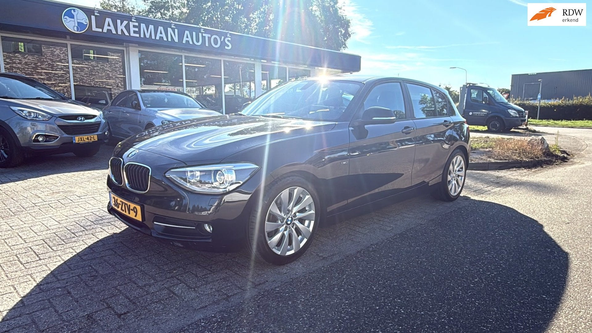 BMW 1-serie 114i EDE Xenon Navi Blackline Huurkoop Inruil AP, Auto's, 1-Serie, Euro 5, Achterwielaandrijving, Gebruikt