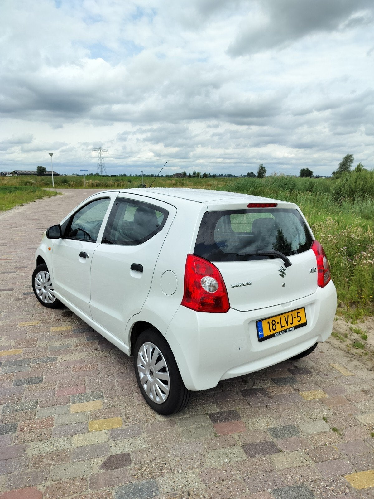 Suzuki Alto 1.0 2010 Wit, Auto's, Suzuki, Voorwielaandrijving, Stof, 200 kg, 4 stoelen