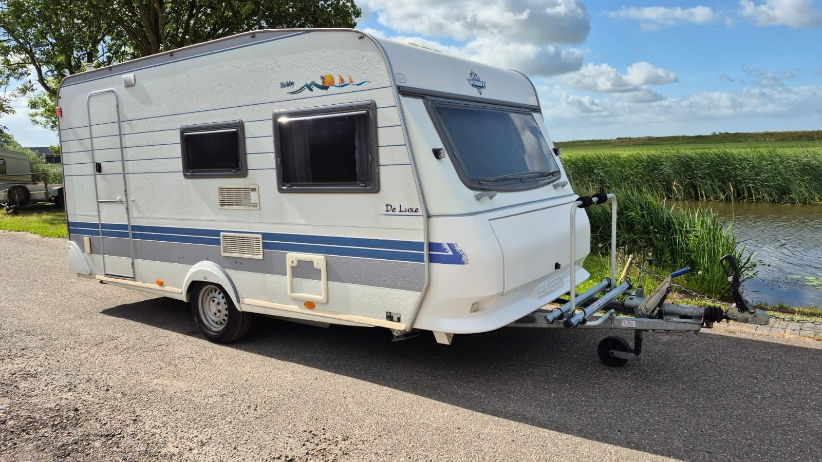 Hobby 440 SF met voortent luifel uitbouw dubbel fietsenrek, Caravans en Kamperen, Hobby, Luifel, Treinzit, Dwarsbed