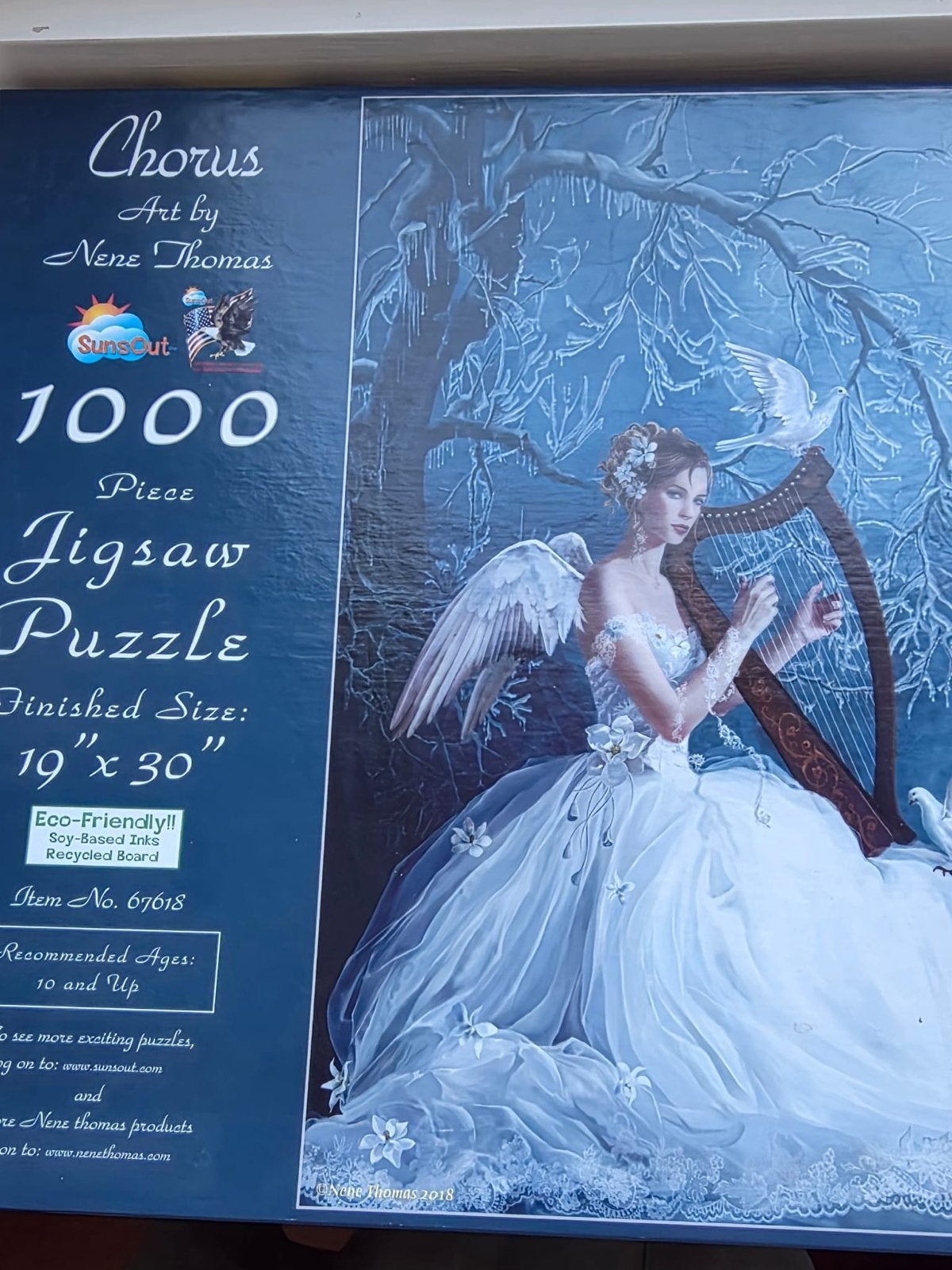 SunsOut Chorus Nene Thomas Jigsaw Puzzel 1000 Stukjes, Hobby en Vrije tijd, Denksport en Puzzels, Ophalen of Verzenden, 500 t/m 1500 stukjes