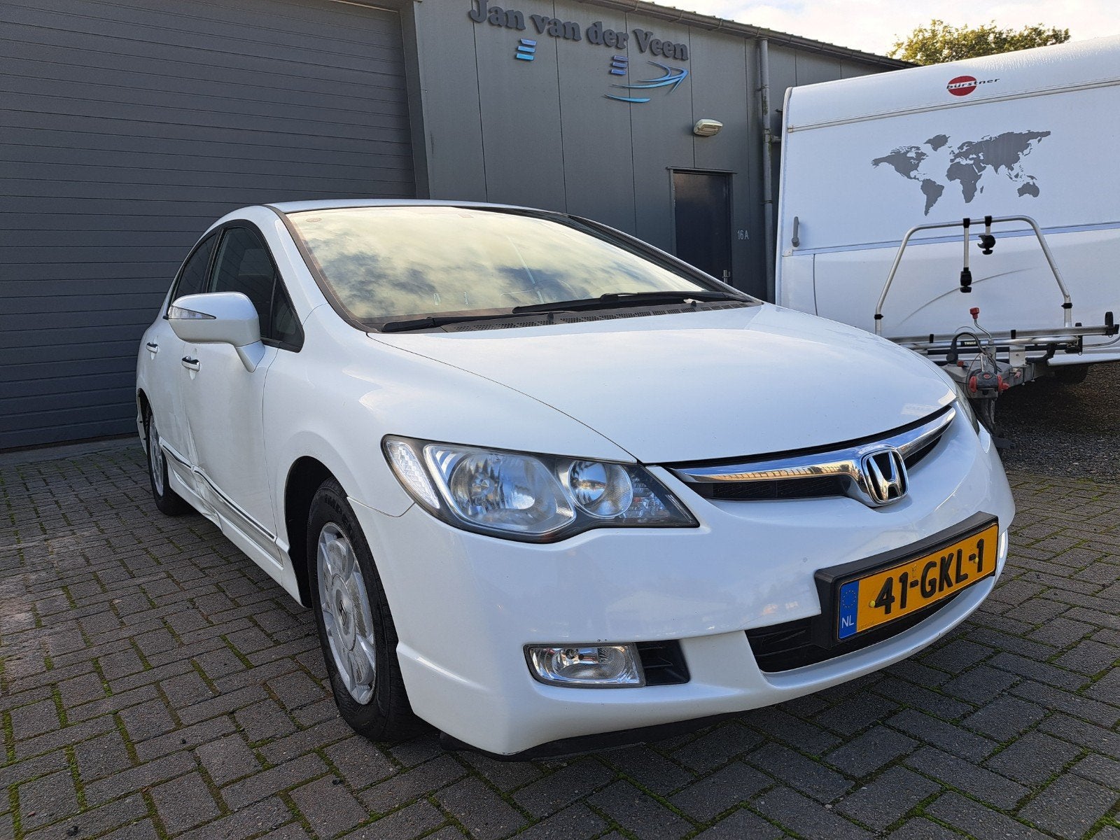Honda Civic 1.3 Vtec Hybrid/Navi/Airco (WERKT)/Apk:11-2026, Stof, Sound system, Wit, Origineel Nederlands