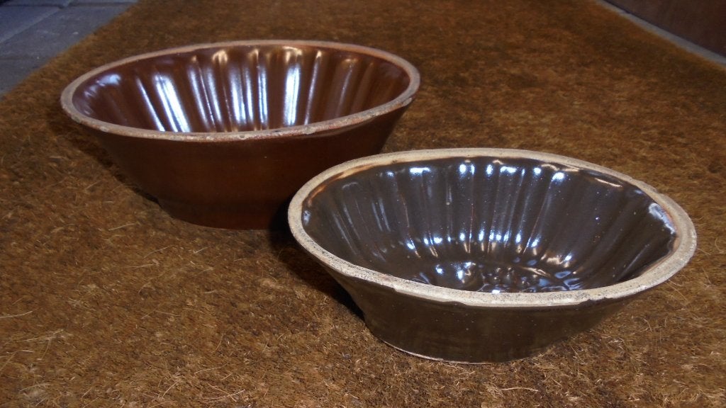 bruin bakelieten puddingvormen 18x13x6,5 & 21x17x9cm, Ophalen of Verzenden