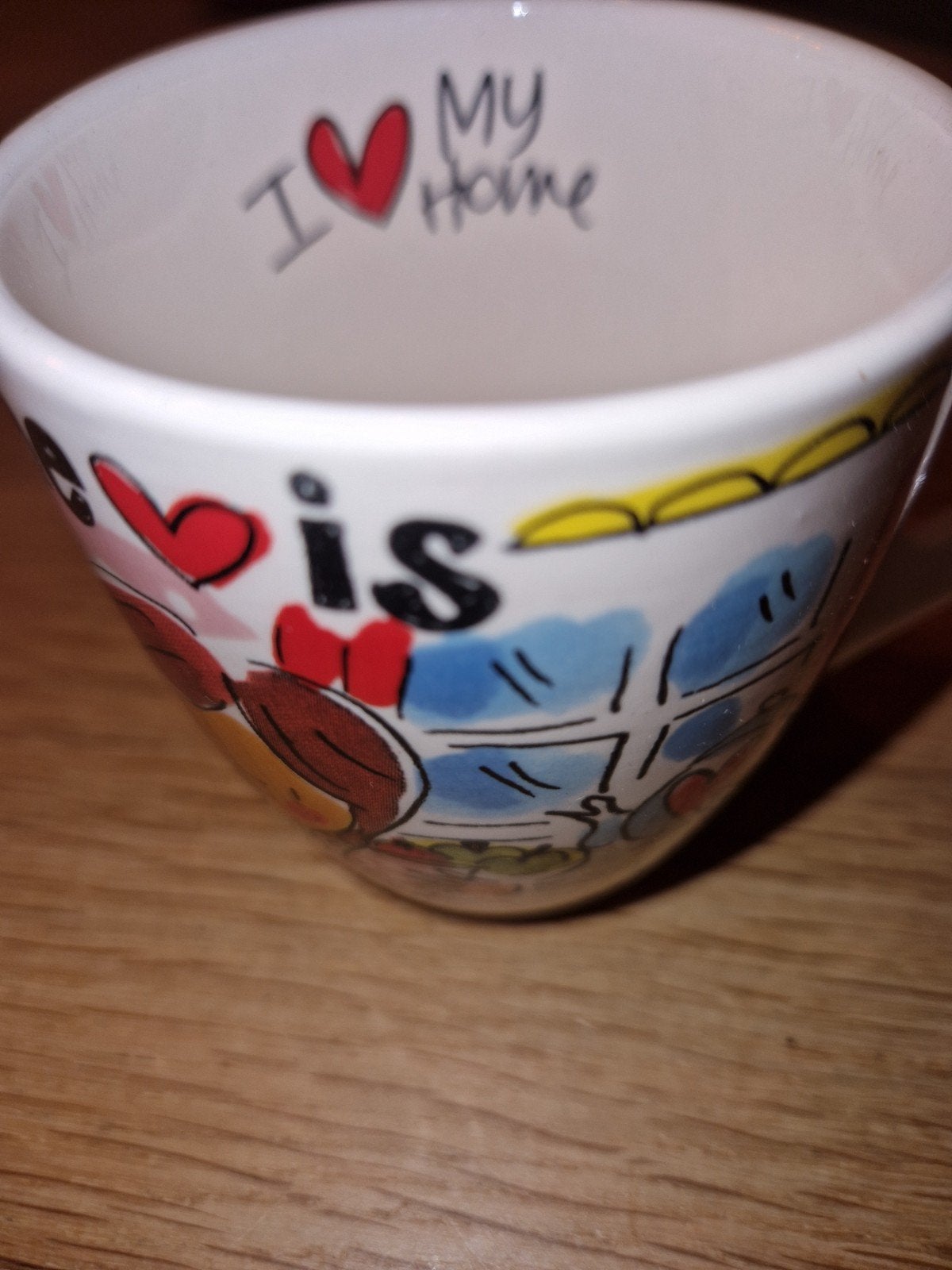 Blond Amsterdam mok met 'Home is where the heart is' opdruk, Huis en Inrichting, Keuken | Servies, Keramiek, Nieuw, Overige stijlen