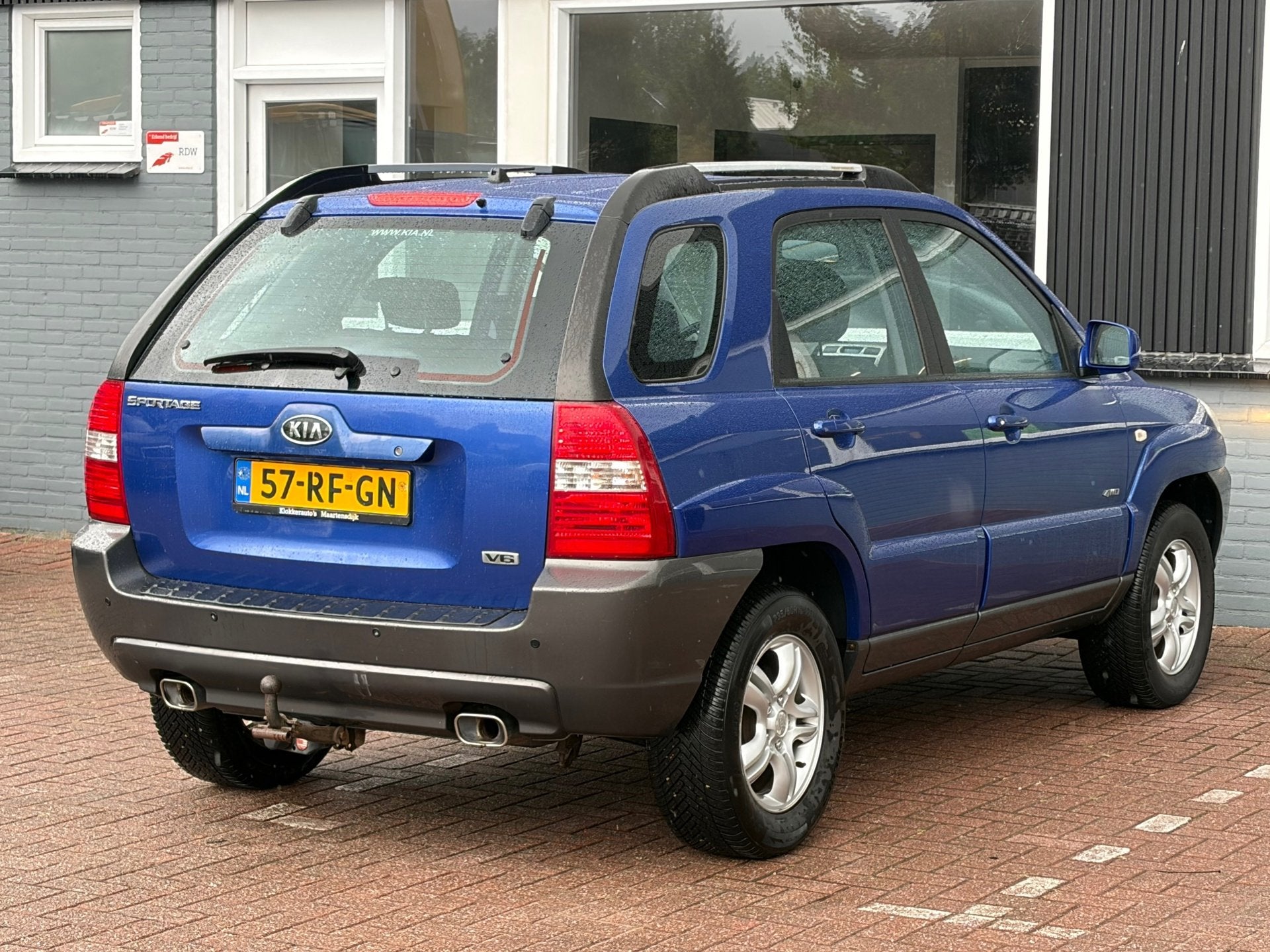 Kia Sportage 2.7 V6 Adventure 4WD / Automaat / APK, Automaat, Automatische klimaatregeling, Gebruikt, Blauw