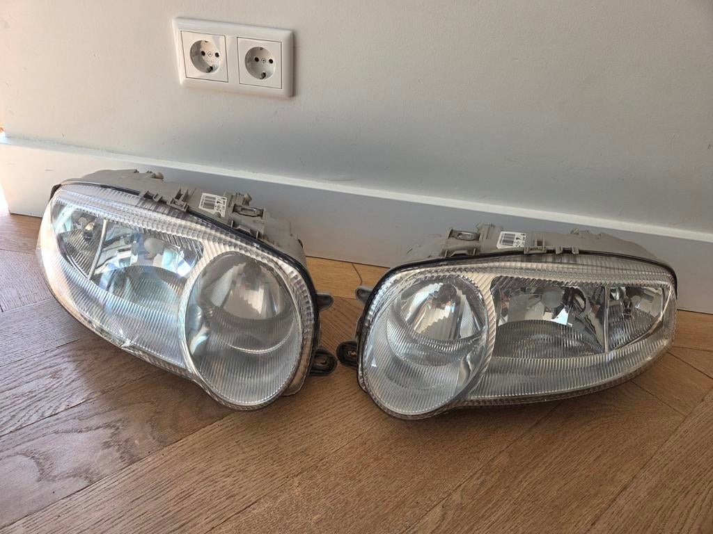 Set nette originele koplampen Alfa Romeo 147, Ophalen of Verzenden, Gebruikt, Alfa Romeo