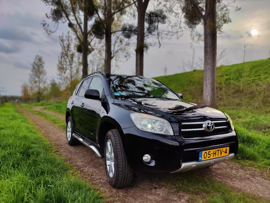 Toyota Rav4 2.0 2009 Zwart Dealeronderhouden Benzine, Auto's, Stof, 1440 kg, Zwart, 4 cilinders
