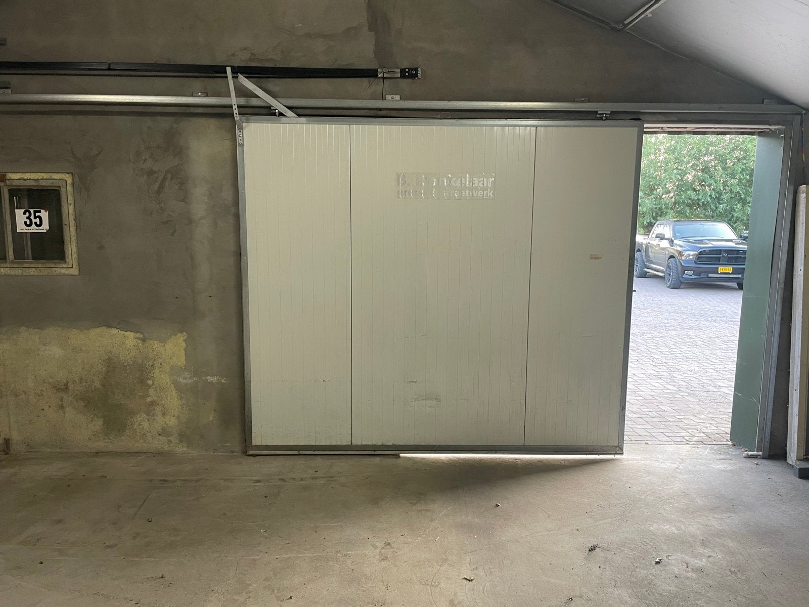 Garagedeur met Lift-Master motor en afstandsbediening, Ophalen, Gebruikt, 120 cm of meer, Garagedeur