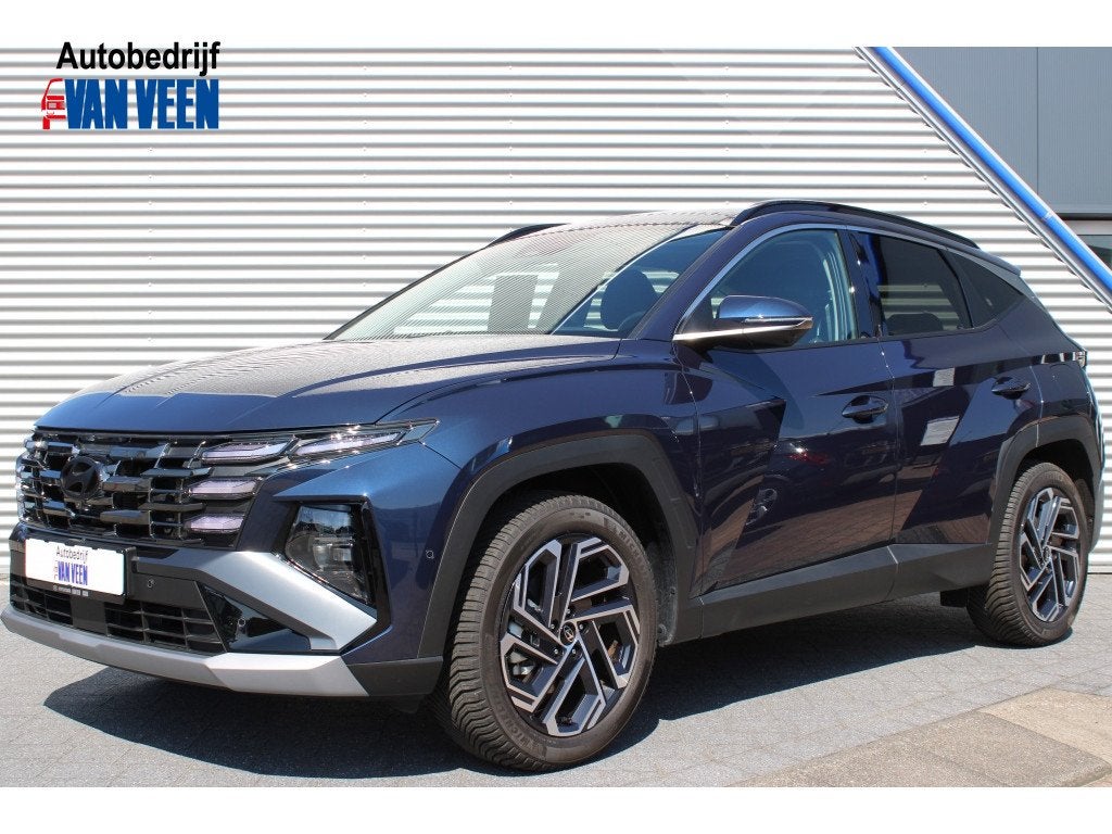 Hyundai Tucson 1.6 T-GDI HEV Premium Sky | Leer | Full Led |, Auto's, Dealer onderhouden, Gebruikt, Zwart, 4 cilinders