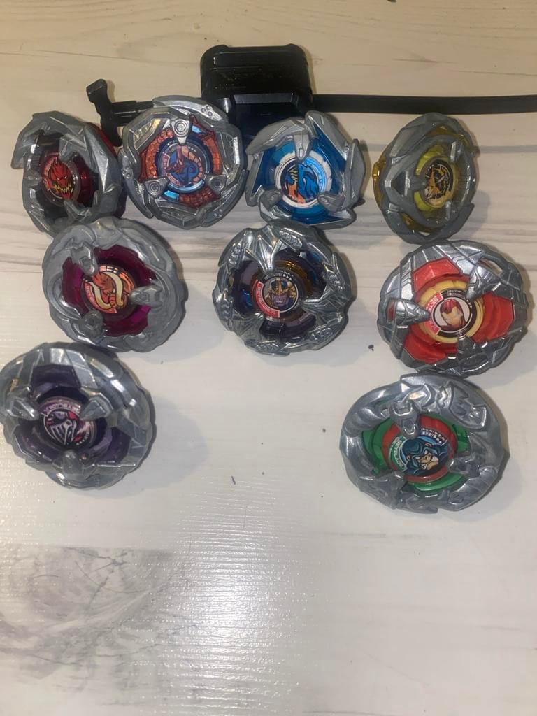 Beyblade set met stadion en 9 Beyblades, Ophalen of Verzenden, Gebruikt