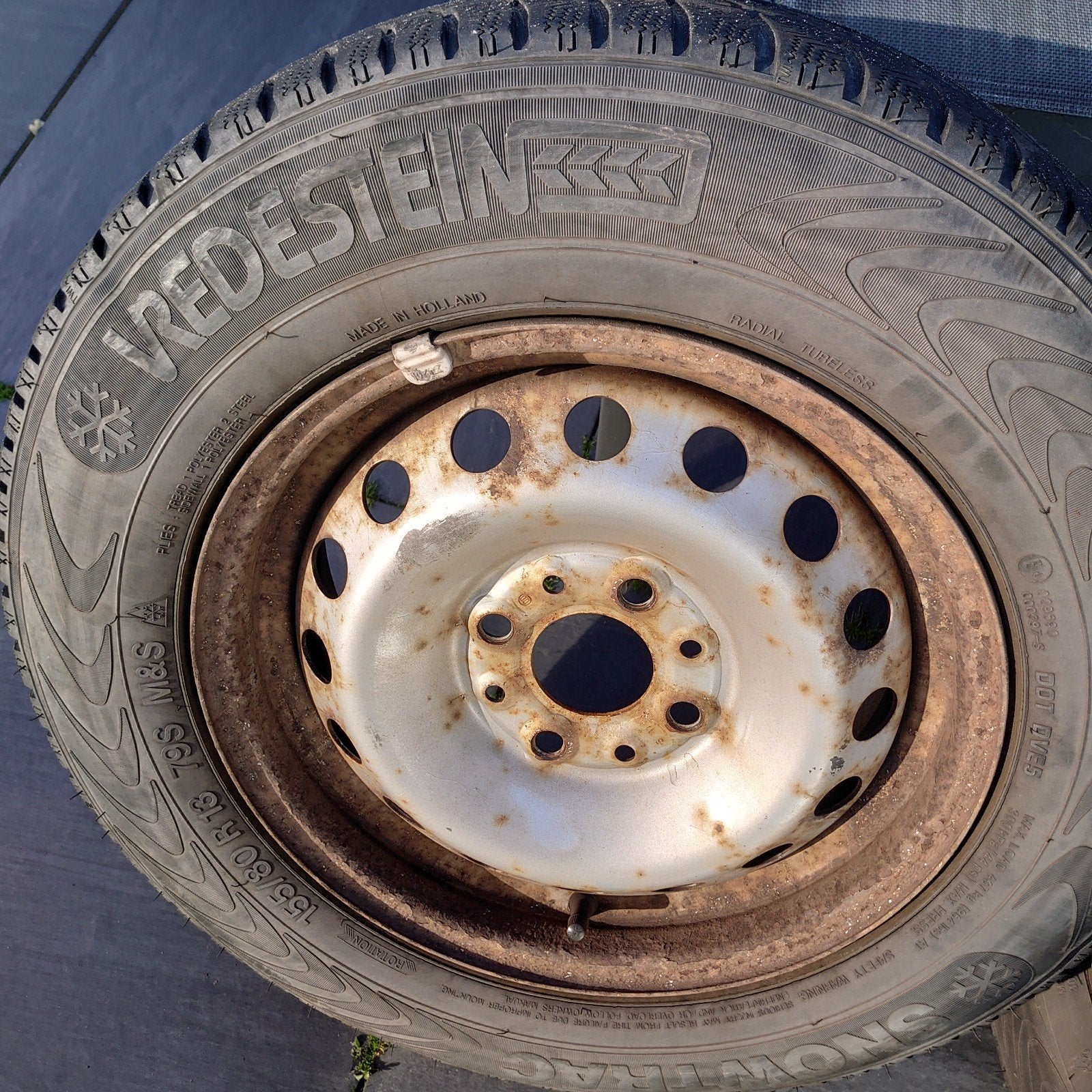 Winterbanden op stalenvelg 155/80 R13, Ophalen