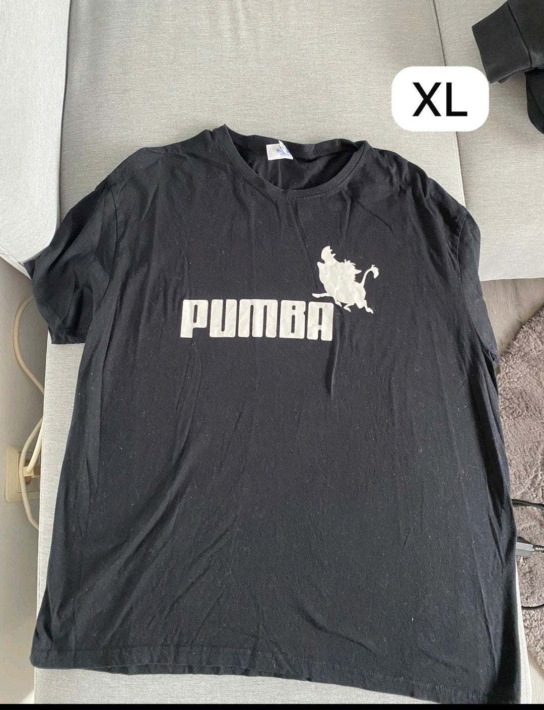 Zwart Pumba T-shirt - Maat XL, Zwart, Maat 46/48 (XL) of groter, Ophalen of Verzenden, Zo goed als nieuw