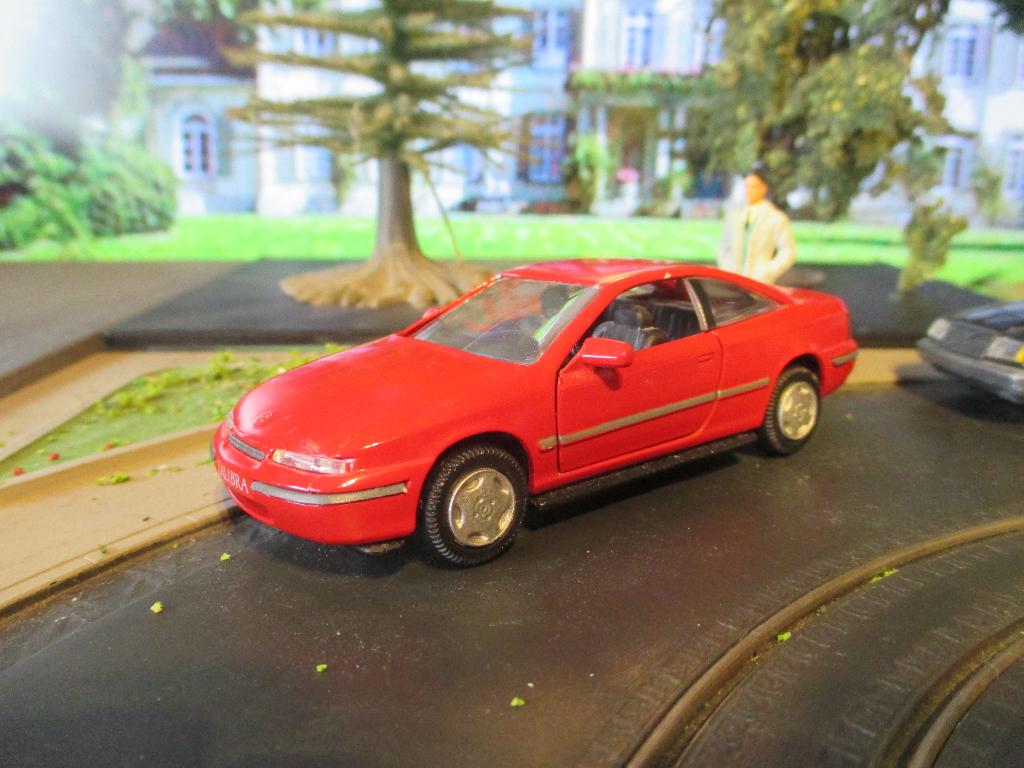 1/43 Opel Calibra A1 - Gama rood, Ophalen of Verzenden, Zo goed als nieuw, Auto, Overige merken