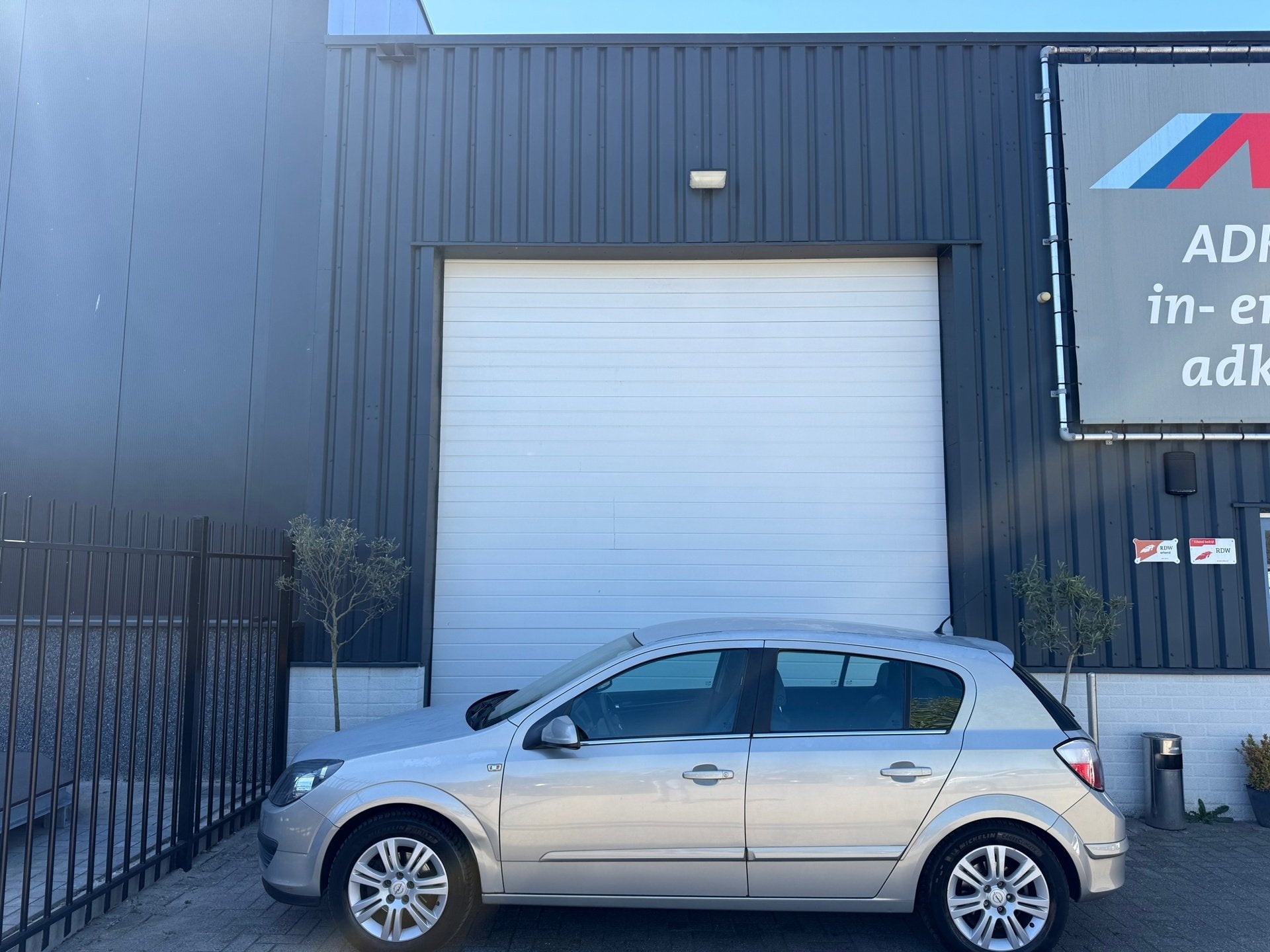 Opel Astra 1.8 Cosmo LPG G3/ HALF LEDER/TREKHAAK/CRUISE/AIRC, Auto's, Opel, 125 pk, Gebruikt, Zwart, 4 cilinders
