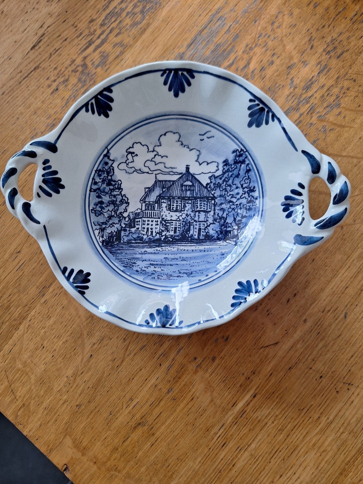 6 blauwe bordjes, Ophalen