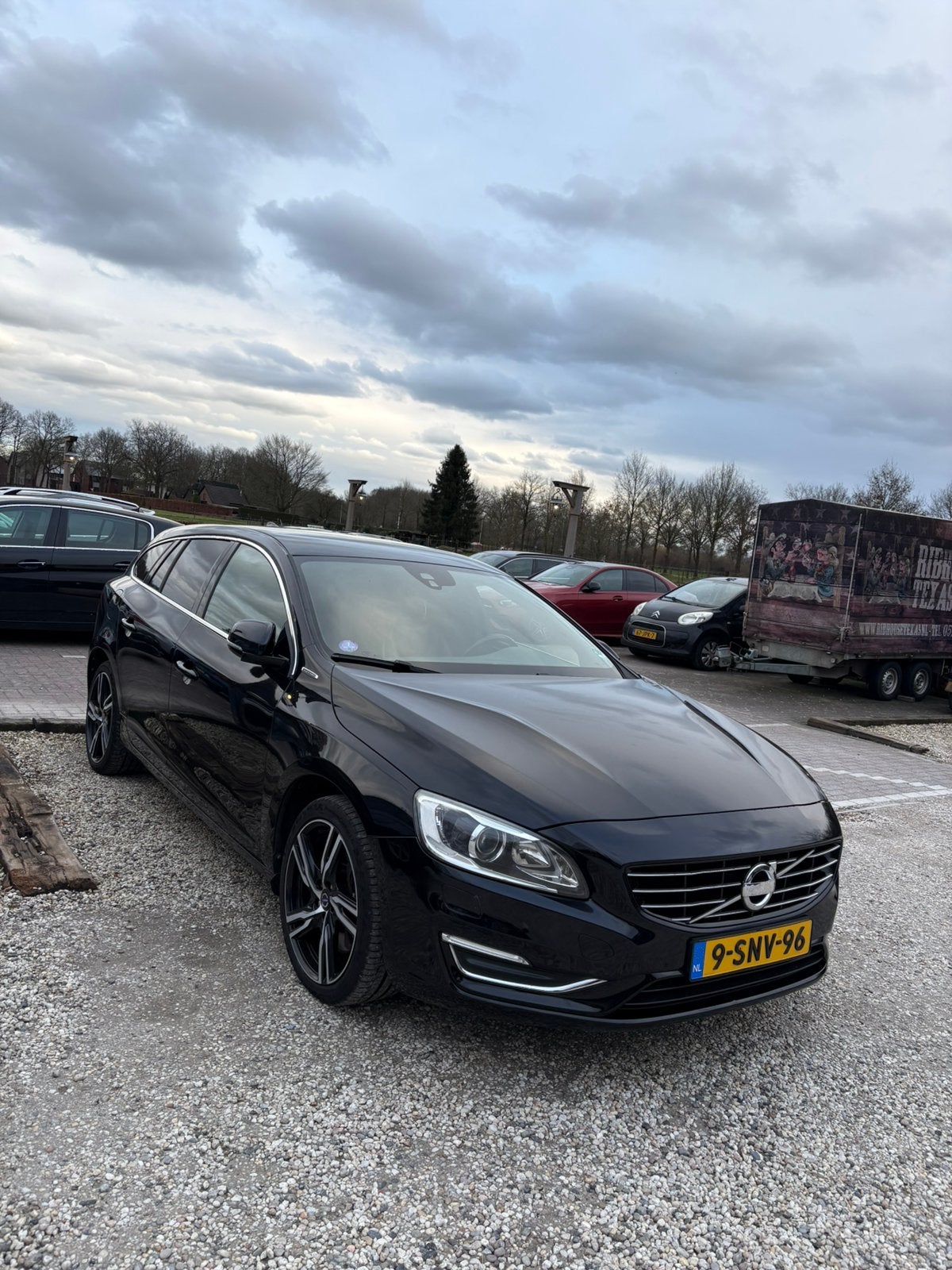Volvo V60 D6 215pk Plug-in Hybrid 2013 Zwart, Auto's, 1849 kg, 1800 kg, Zwart, Particulier