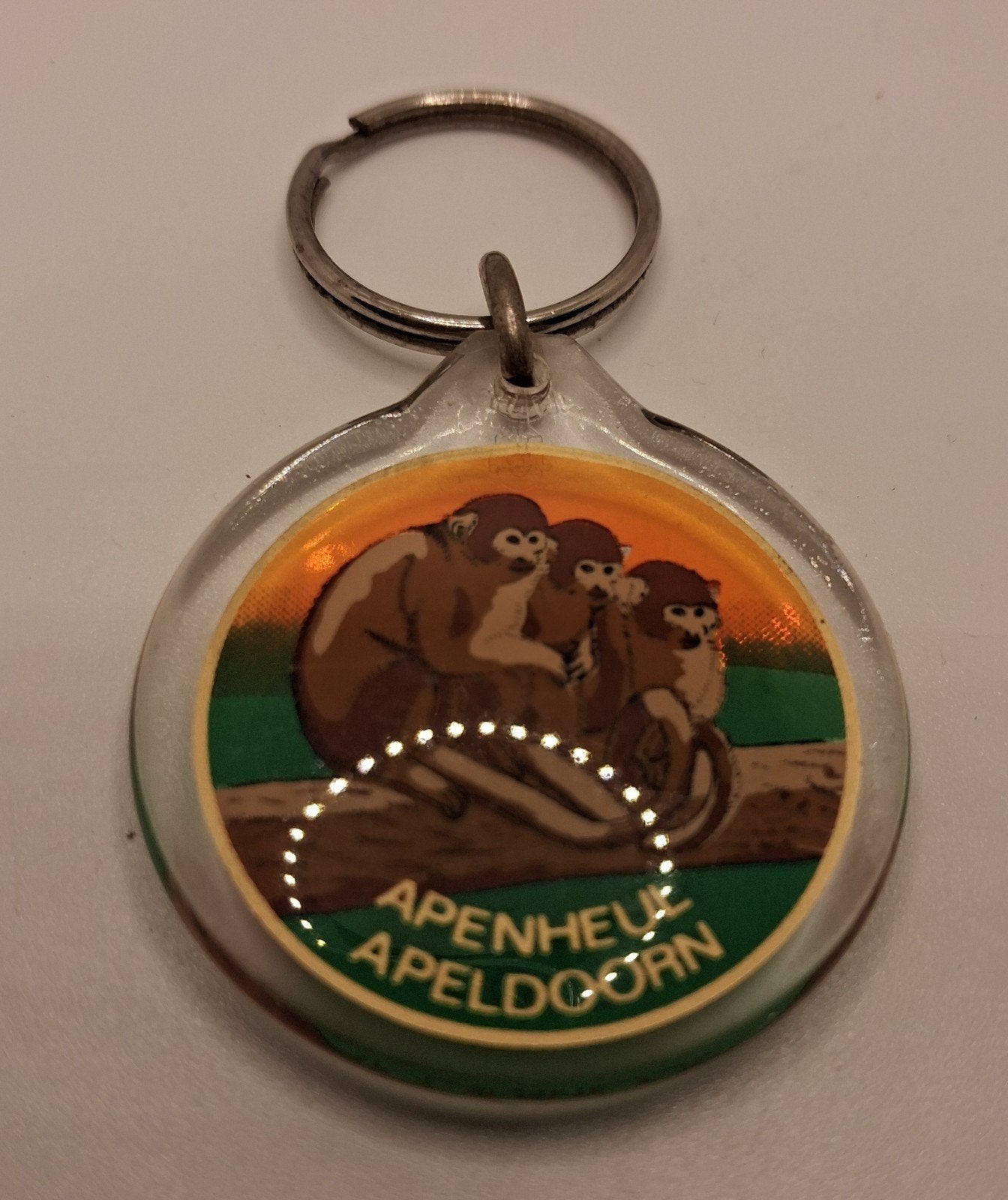 Sleutelhanger Apenheul Apeldoorn met apenafbeelding, Ophalen of Verzenden, Gebruikt, Dier of Natuur