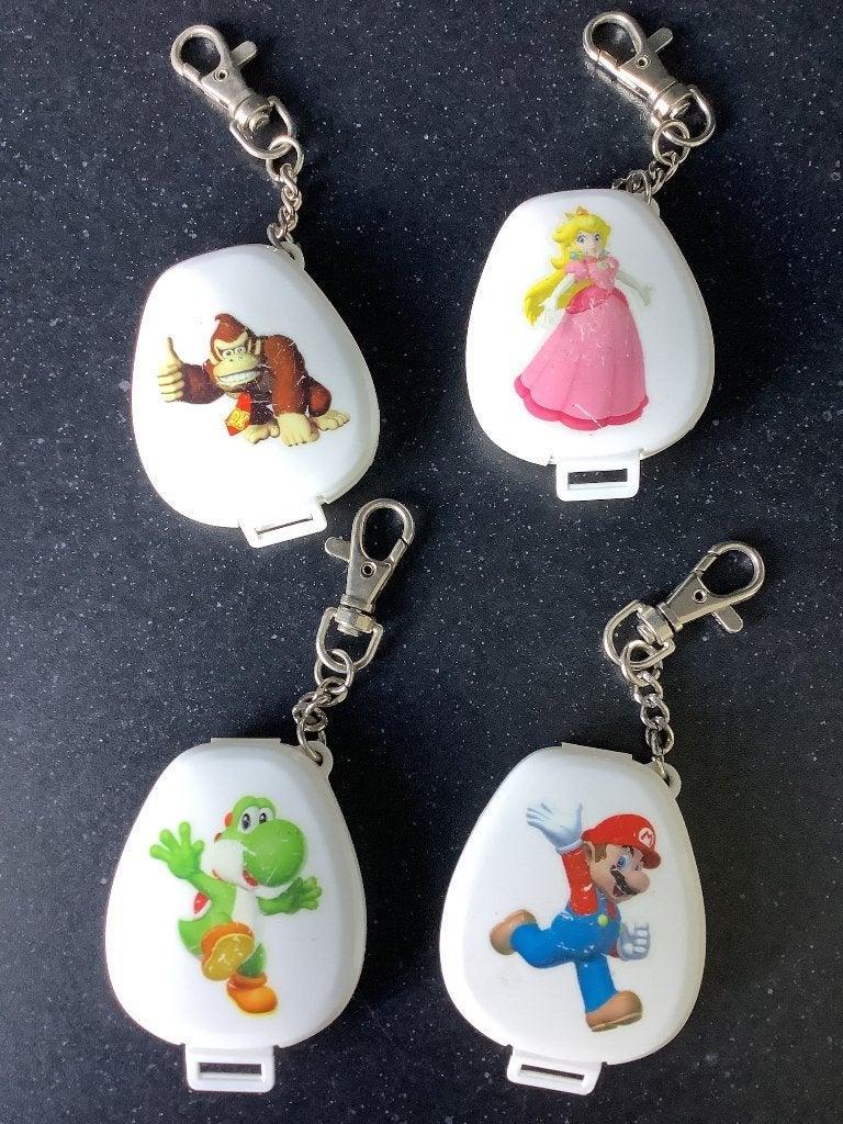 Nintendo DS sleutelhanger met opberghoesje Super Mario afb., Ophalen of Verzenden, Zo goed als nieuw, Overige typen